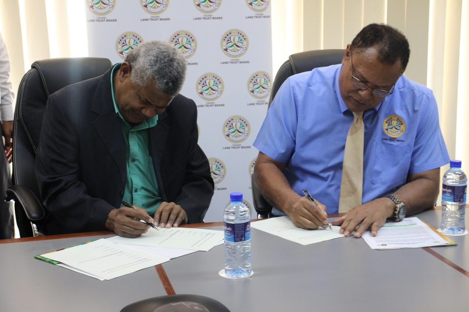 General Manager FHCL Mr. Semi Dranibaka (left) and iTLTB CEO Mr. Solomoni Nata (right) at the signing of the MOU and MOA between FHCL and iTLTB.